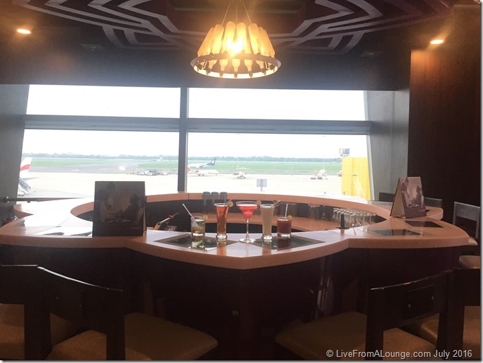 The lounge has a pretty backdrop to its bar, overlooking the apron