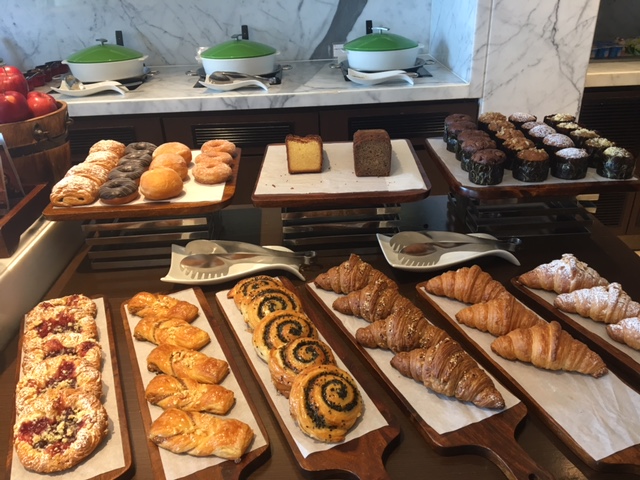 a table with different pastries on it