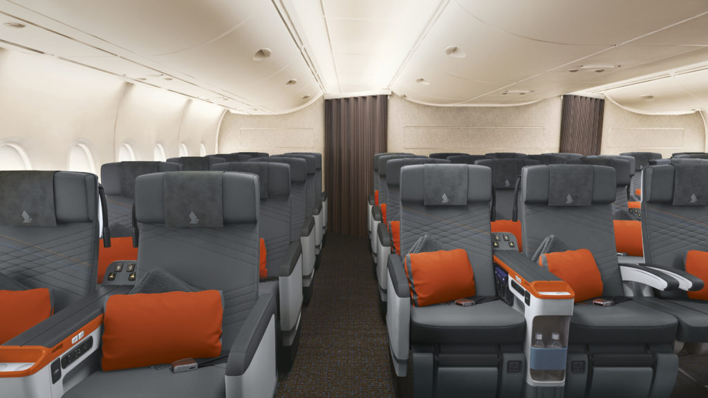 an airplane with grey and orange seats