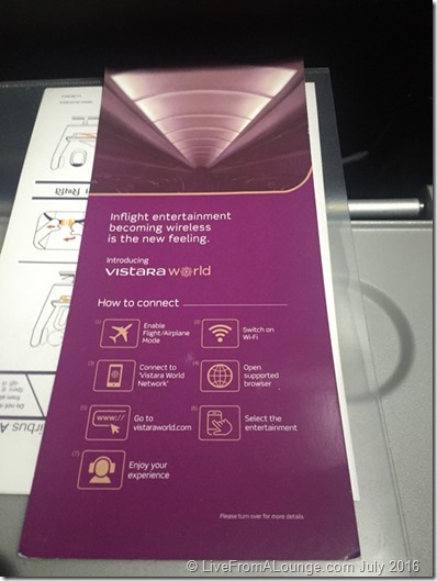 a purple brochure on a plane