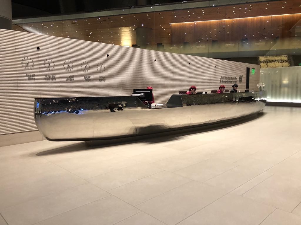 a silver boat in a lobby