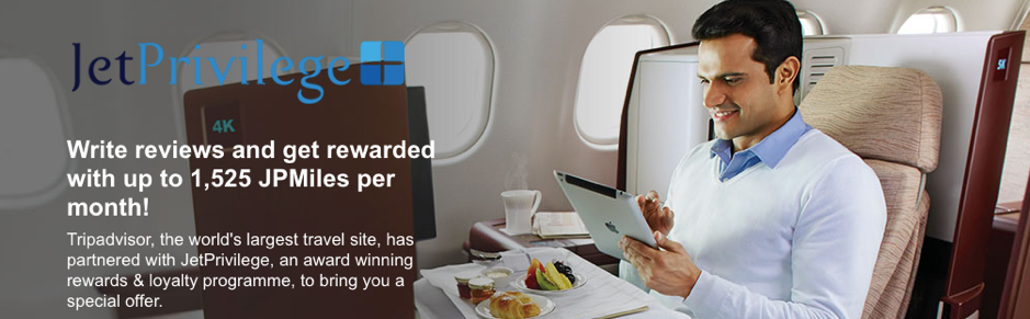 a man using a tablet on an airplane