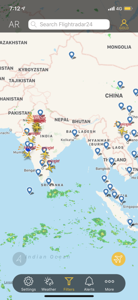 a map of asia with blue pins