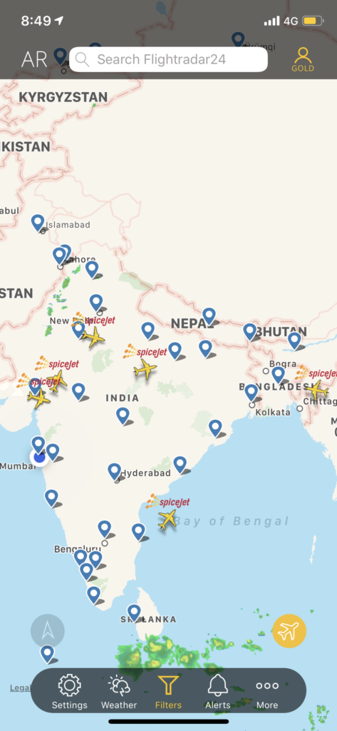 a map of india with planes and blue points
