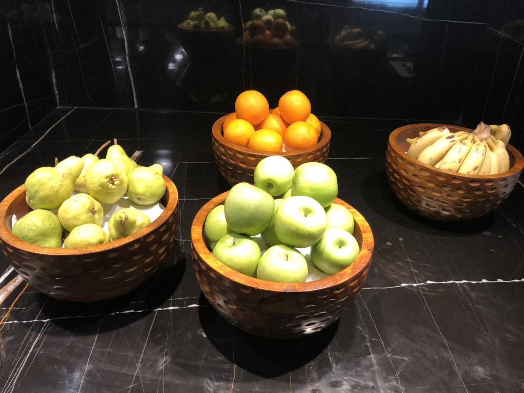 a group of fruit in bowls