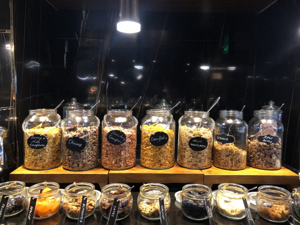 a shelf with jars of food