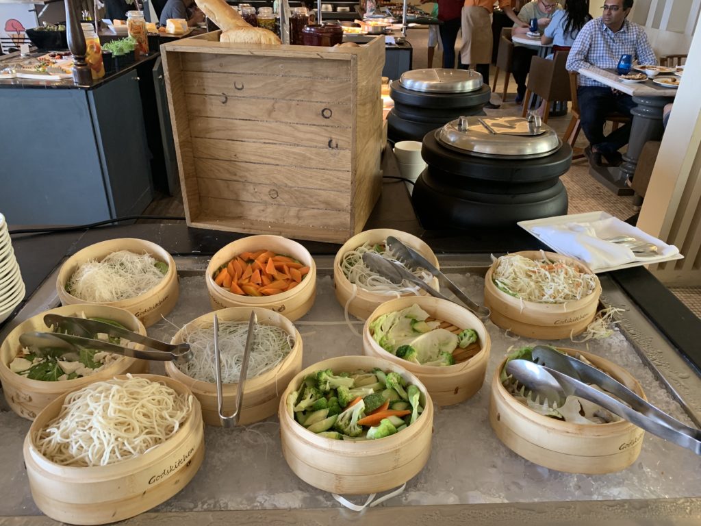 a group of bowls of food