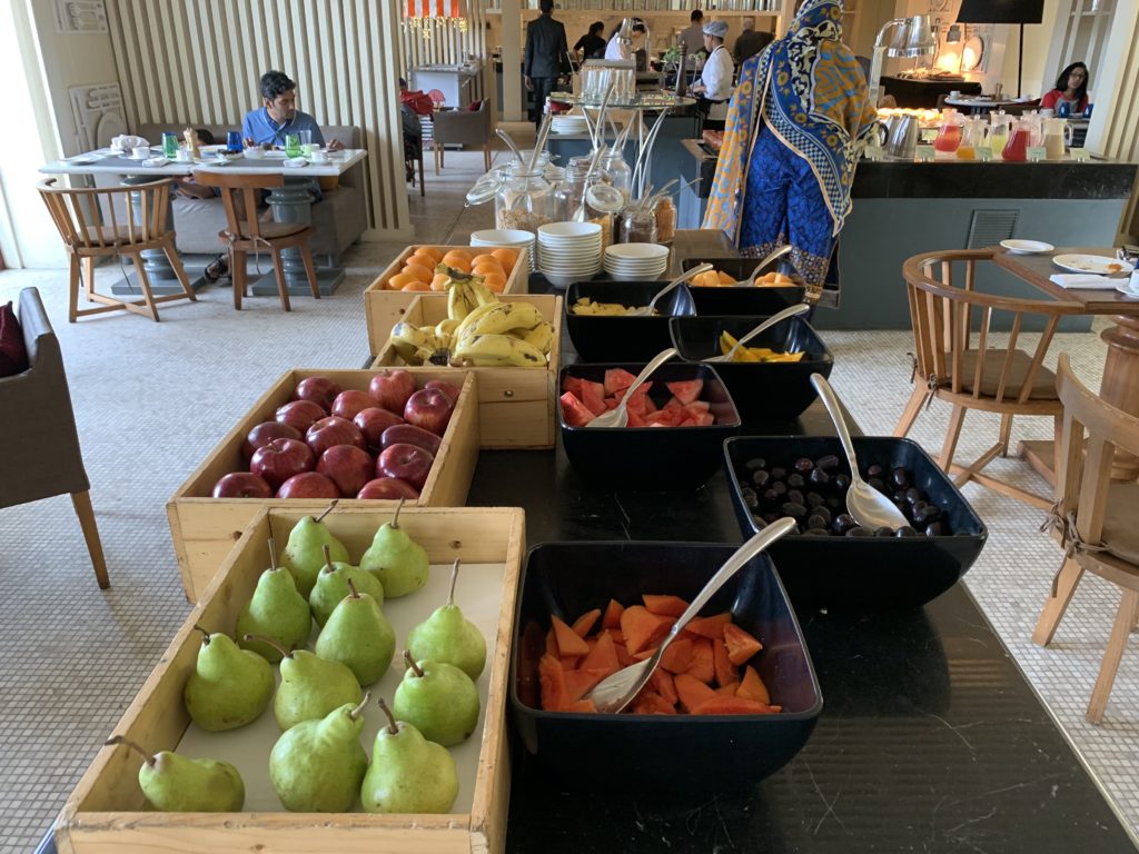 a buffet table full of fruit