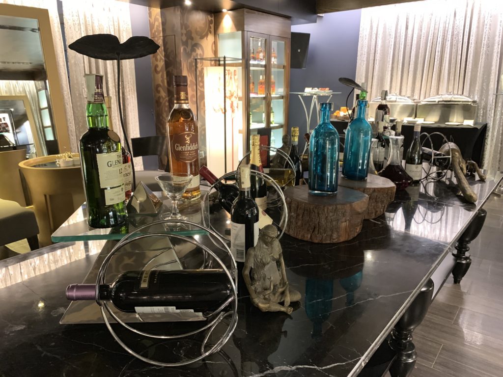 a table with bottles of alcohol on it