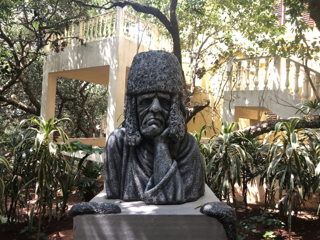 a statue of a man in a hat