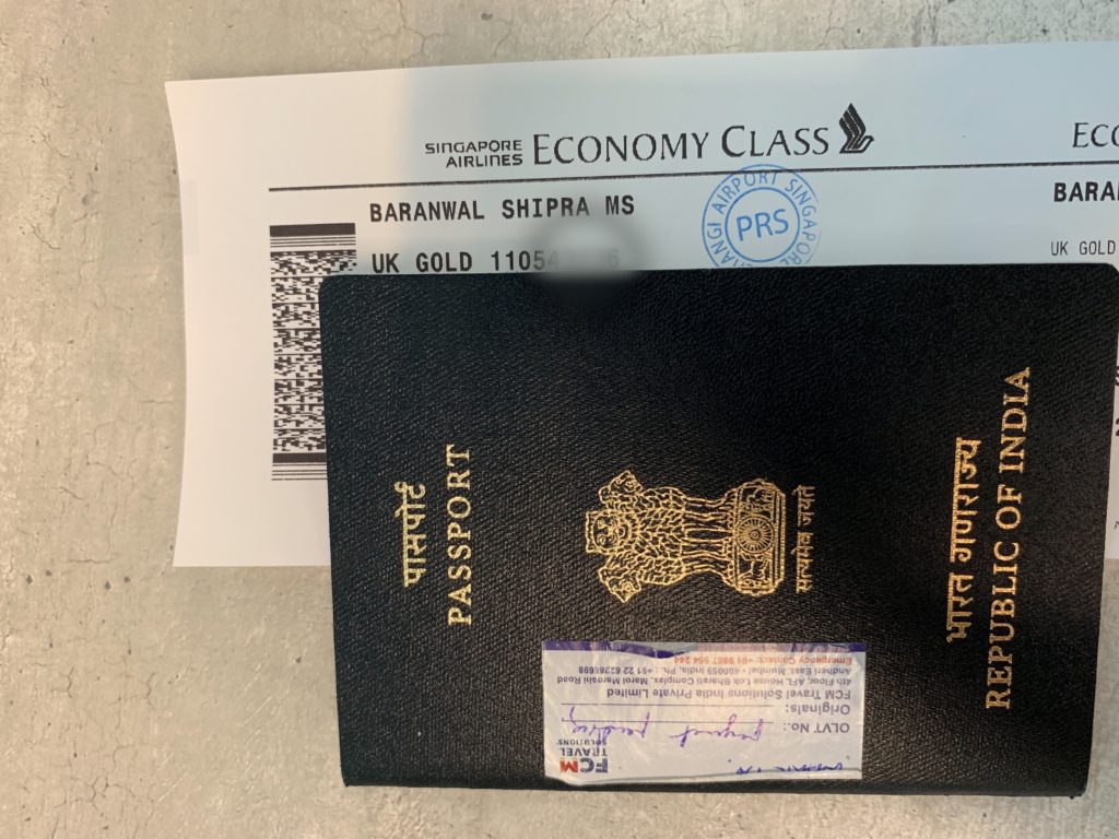 a passport and a boarding pass