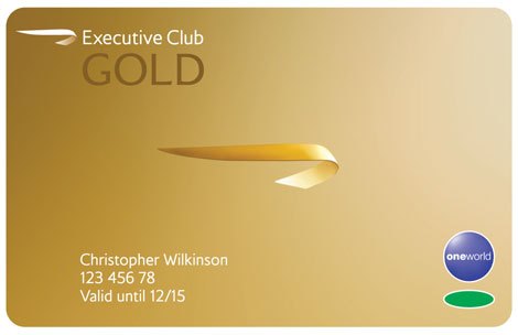 a business card with a gold ribbon