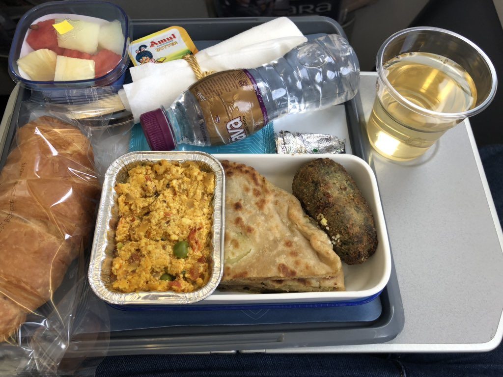 a tray of food and drinks on a tray