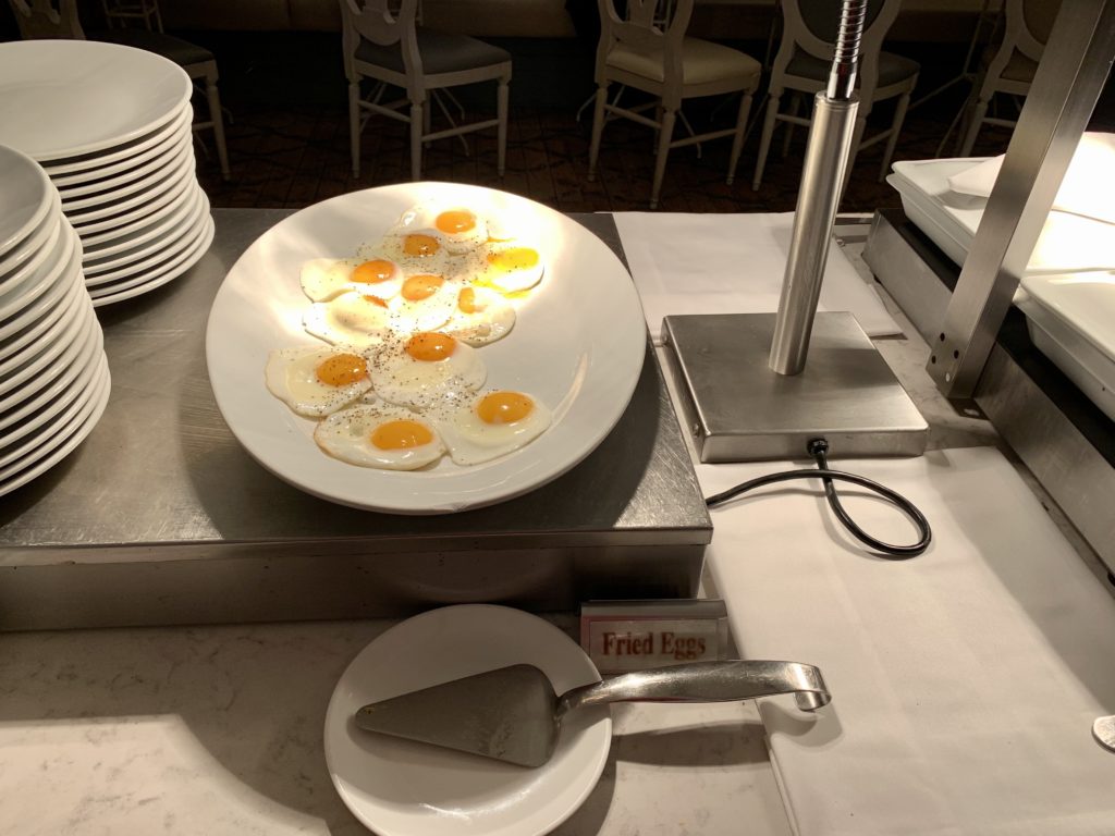 a plate of fried eggs on a table